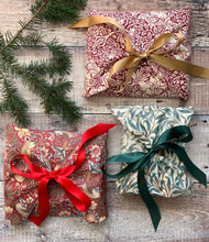 furoshiki wrapping, fabric used to wrap gifts, william morris printed cottons, lined with tafetta, ribbons at 2 corners to tie and secure your gifts.